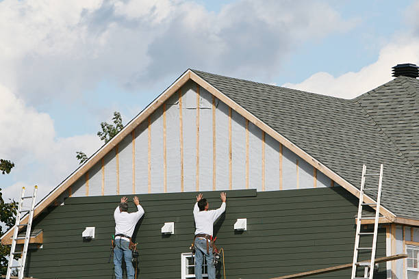 Professional Siding Contractor technician working in Plano, TX